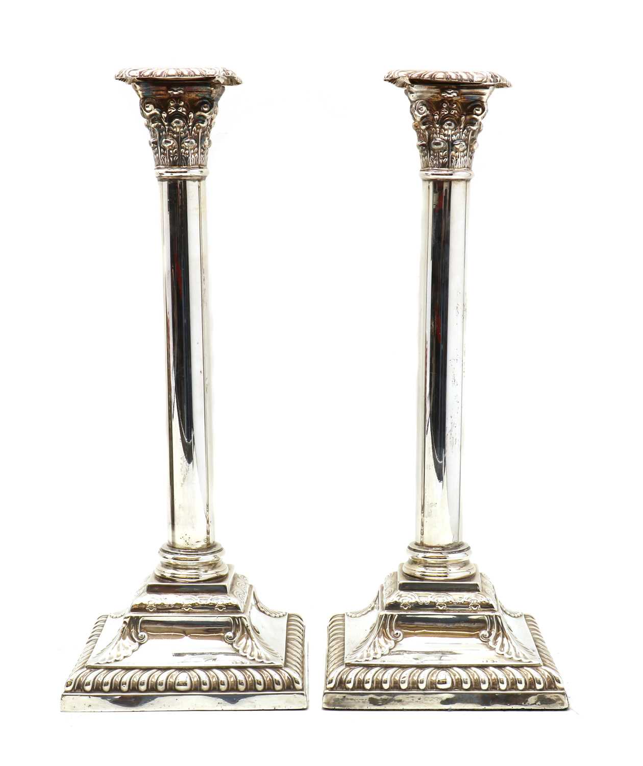 A pair of Victorian silver candlesticks,