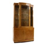 A bird's eye maple and inlaid display cabinet,