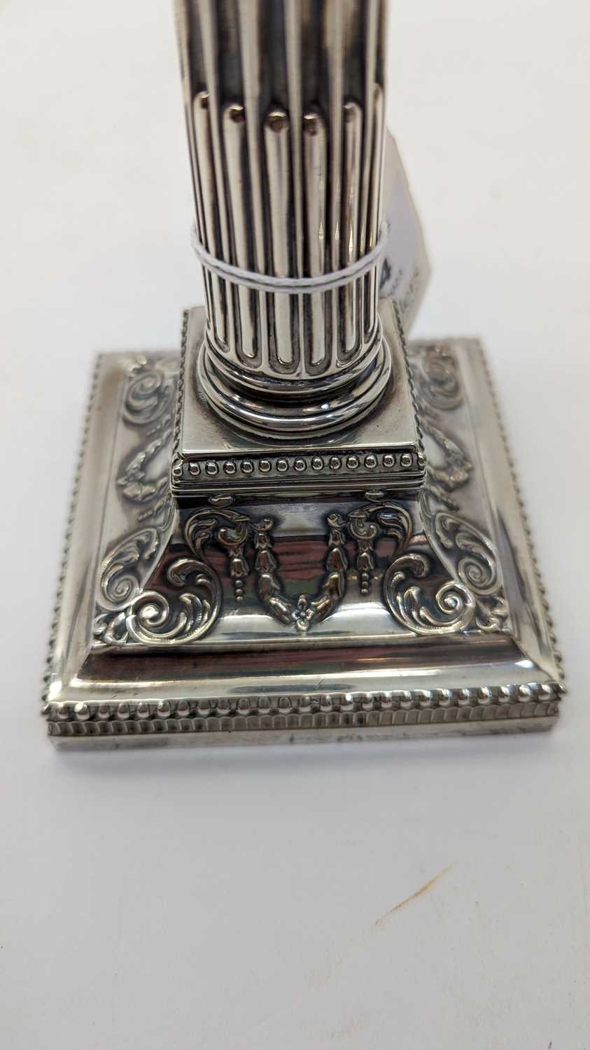 A pair of Victorian silver candlesticks - Image 9 of 24
