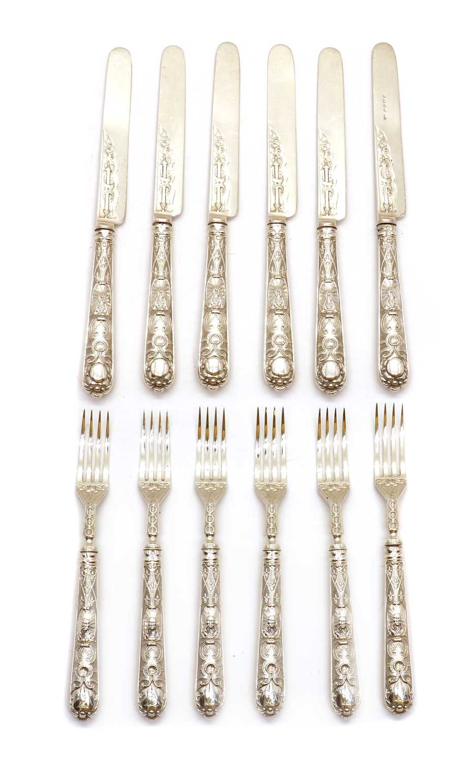 A set of Victorian silver knives and forks,