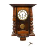 A Victorian walnut wall clock