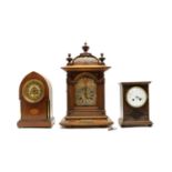 An Edwardian inlaid mahogany lancet top mantel clock,