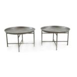 A pair of hammered metal tray-top side tables