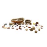 A collection of semi precious stones and shells