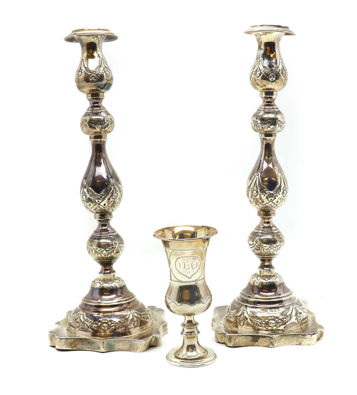 A pair of silver candlesticks