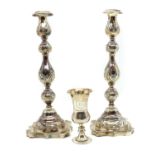 A pair of silver candlesticks