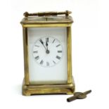 A brass repeater carriage clock