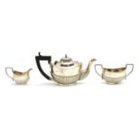 A three piece silver tea service