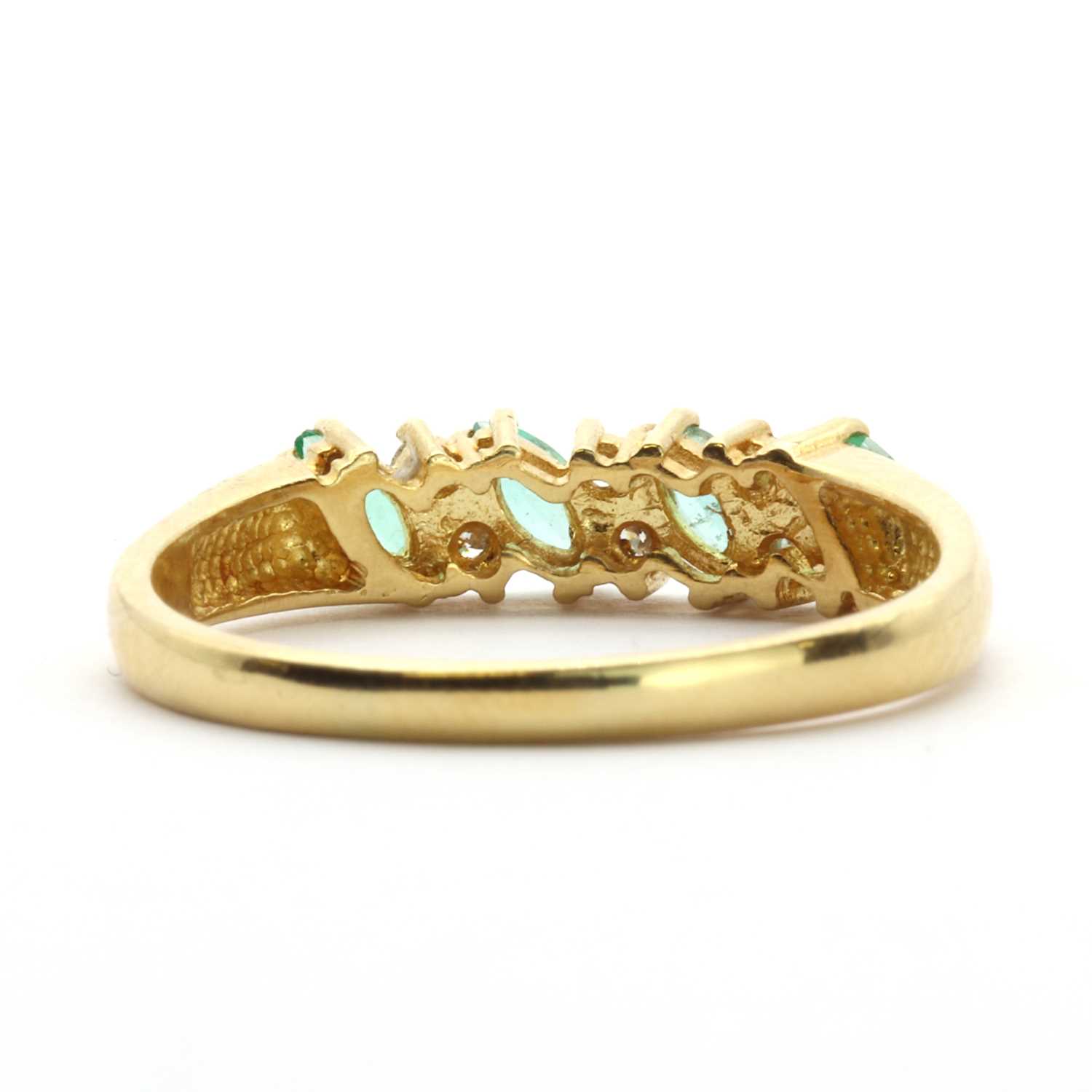 An 18ct gold emerald and diamond half eternity ring, - Image 2 of 3