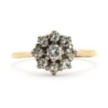 An 18ct gold diamond daisy cluster ring,