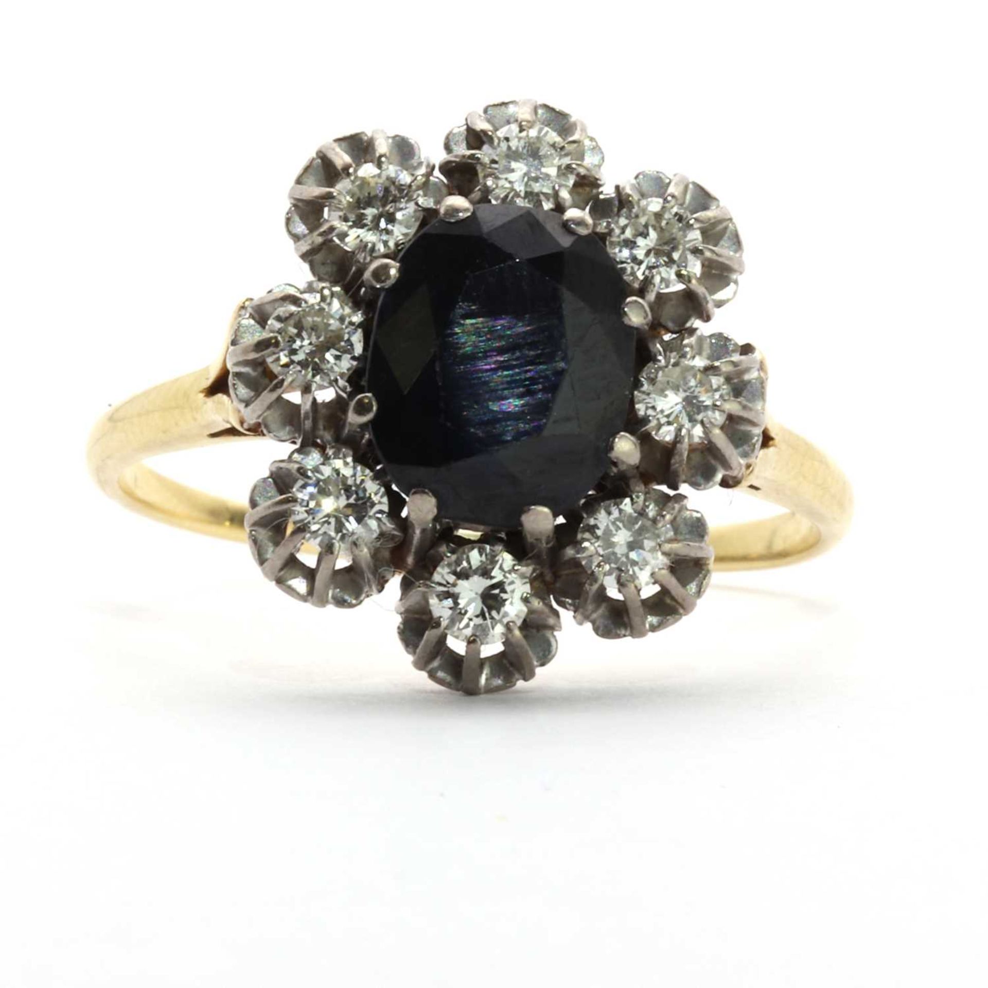 A gold sapphire and diamond floral cluster ring,