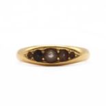 An 18ct gold five stone split pearl ring,