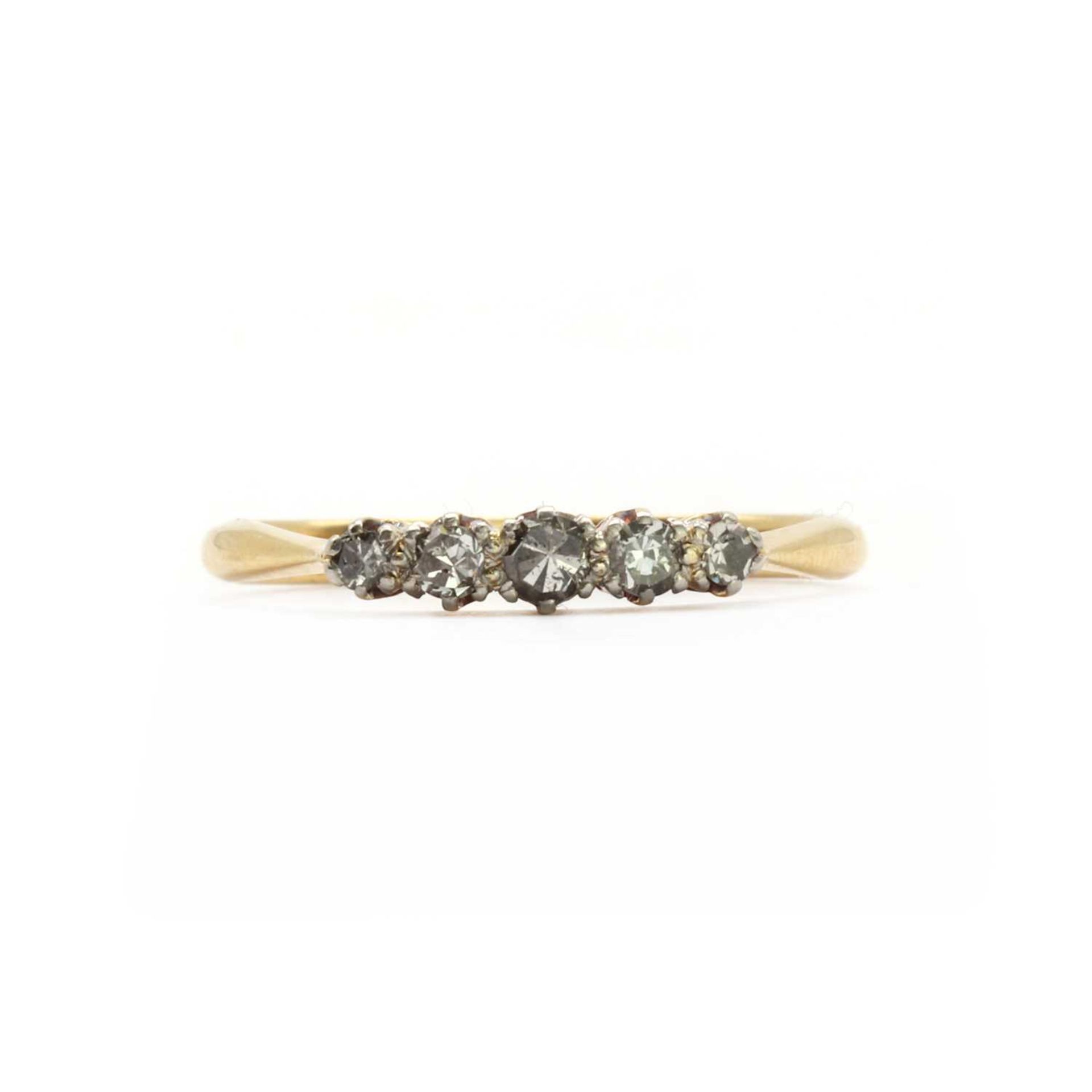 A gold five stone diamond ring,