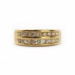 An 18ct gold diamond half-eternity style ring,