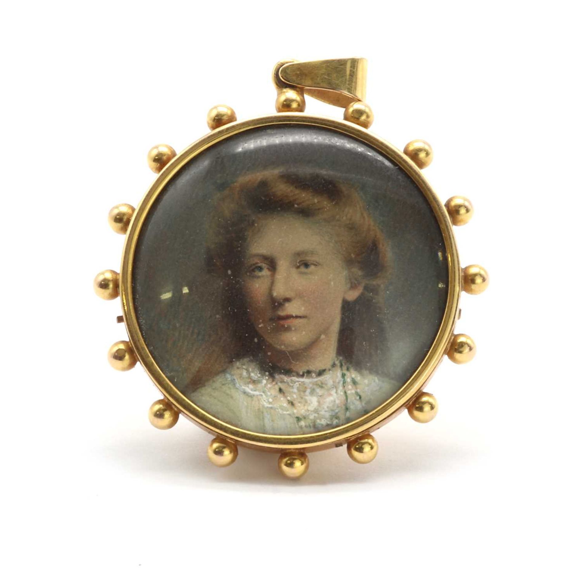 A Victorian gold mounted miniature portrait pendant,