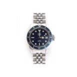 A gentlemen's stainless steel Tag Heuer 1000 Series quartz bracelet watch,