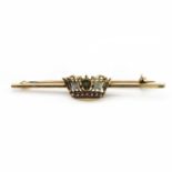 A gold enamel and split pearl Naval crown bar brooch,