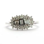 An 18ct white gold three stone diamond cluster ring,