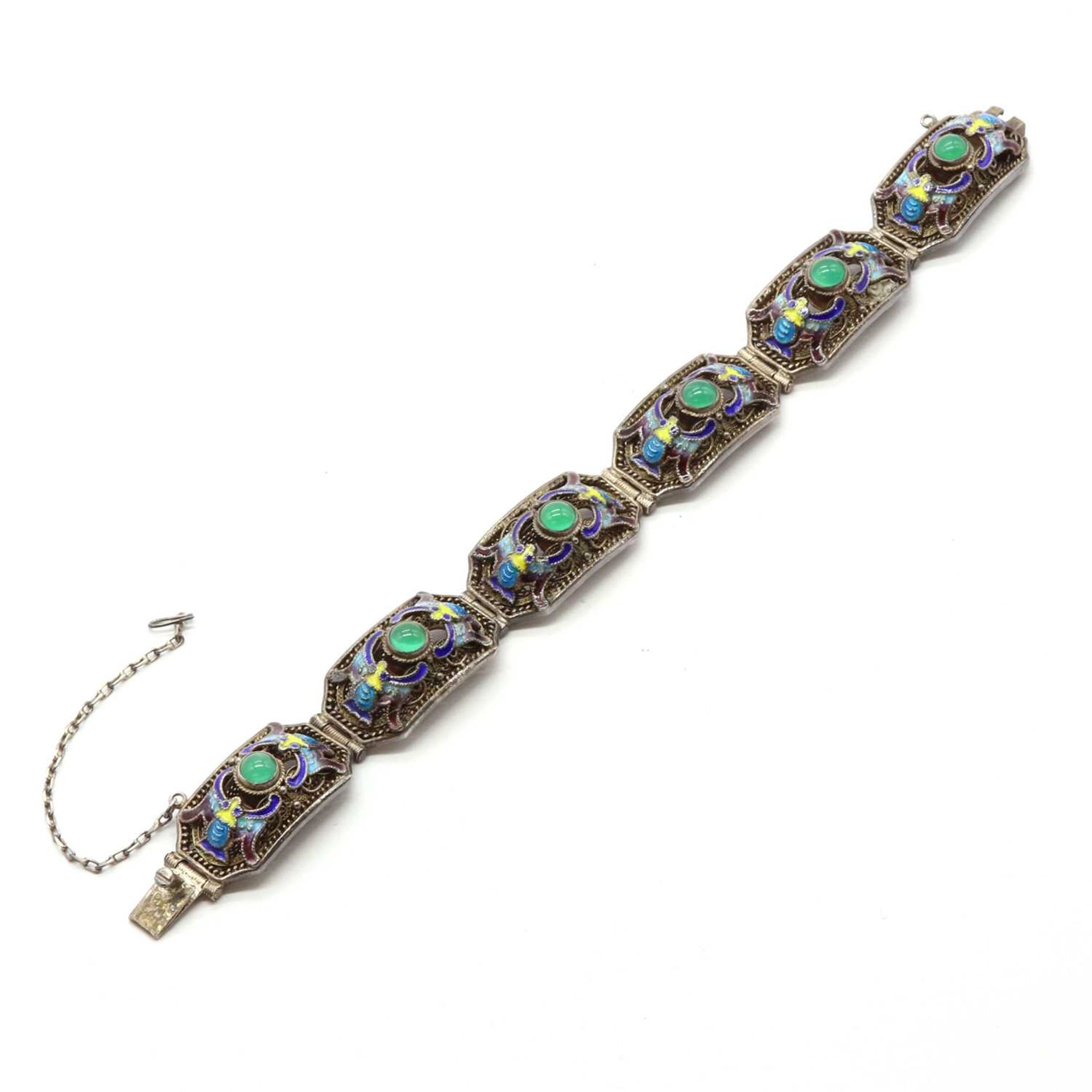 A Chinese export silver gilt and enamel panel bracelet,