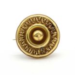 A Victorian gold shield design brooch,