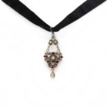 An Austro Hungarian silver gilt, foiled garnet and blister pearl pendant,