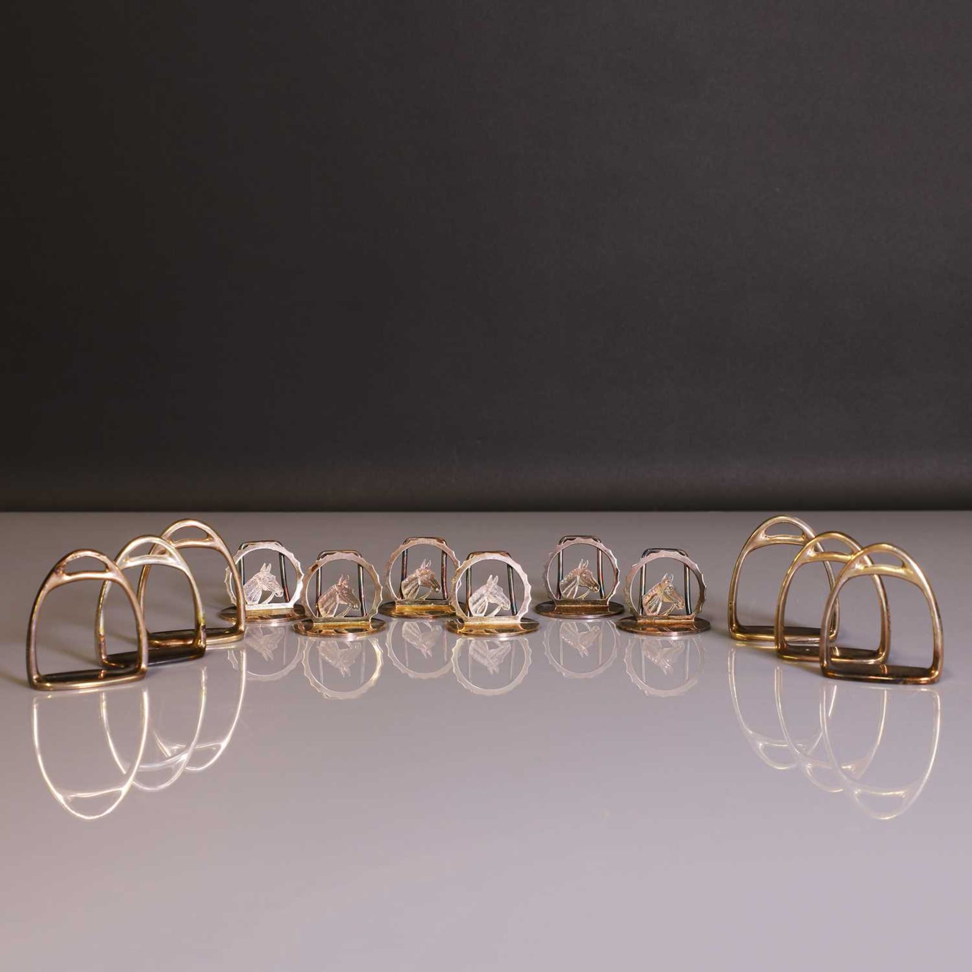 Of Equestrian Interest: A set of six silver placeholders and six napkin rings, - Image 2 of 5