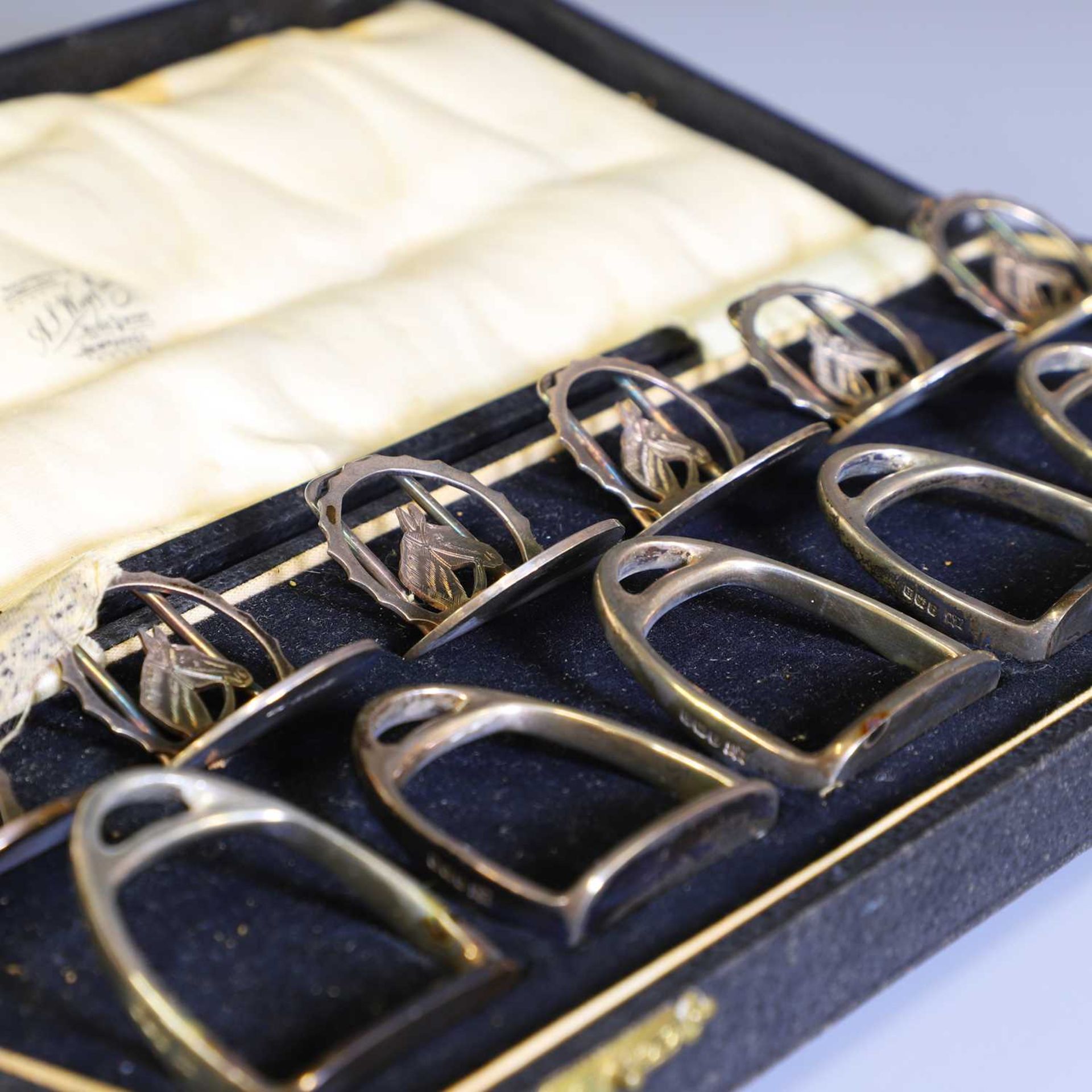 Of Equestrian Interest: A set of six silver placeholders and six napkin rings, - Image 5 of 5