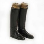 A pair of gentleman's black leather hunting boots