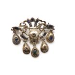 A sapphire and diamond brooch,