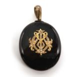 A Victorian onyx and split pearl memorial picture locket, c.1880,