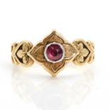 An 18ct gold garnet memorial ring,