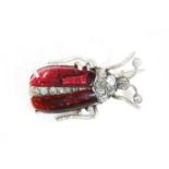 A Victorian foil backed red paste and diamond set beetle brooch,