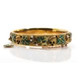 A Russian enamel and seed pearl gold hinged bangle, c.1848,