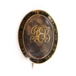 A Georgian gold oval memorial brooch,