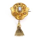 A Victorian opal, ruby and diamond shield form brooch,