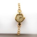 A ladies' 18ct gold Rolex Orchid mechanical strap watch,