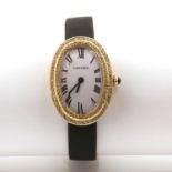 A ladies' 18ct gold Cartier 'Bagnoire' strap watch,