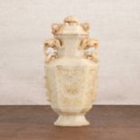 A Chinese soapstone vase and cover,