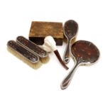 A silver mounted and tortoiseshell dressing table set,