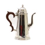 A silver coffee pot