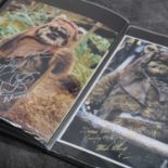 Three albums of signed Star Wars photographs