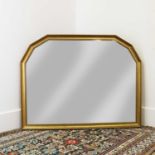 A large overmantle mirror