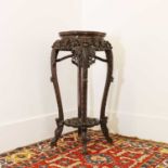 A Chinese hardwood jardiniere stand,