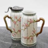 A pair of Pinder, Bourne & Co stoneware jugs,