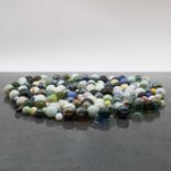 A large collection of glass marbles,