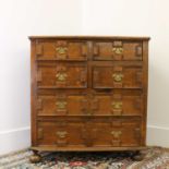 An oak chest of drawers,