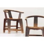 A pair of elm horseshoe-back chairs,