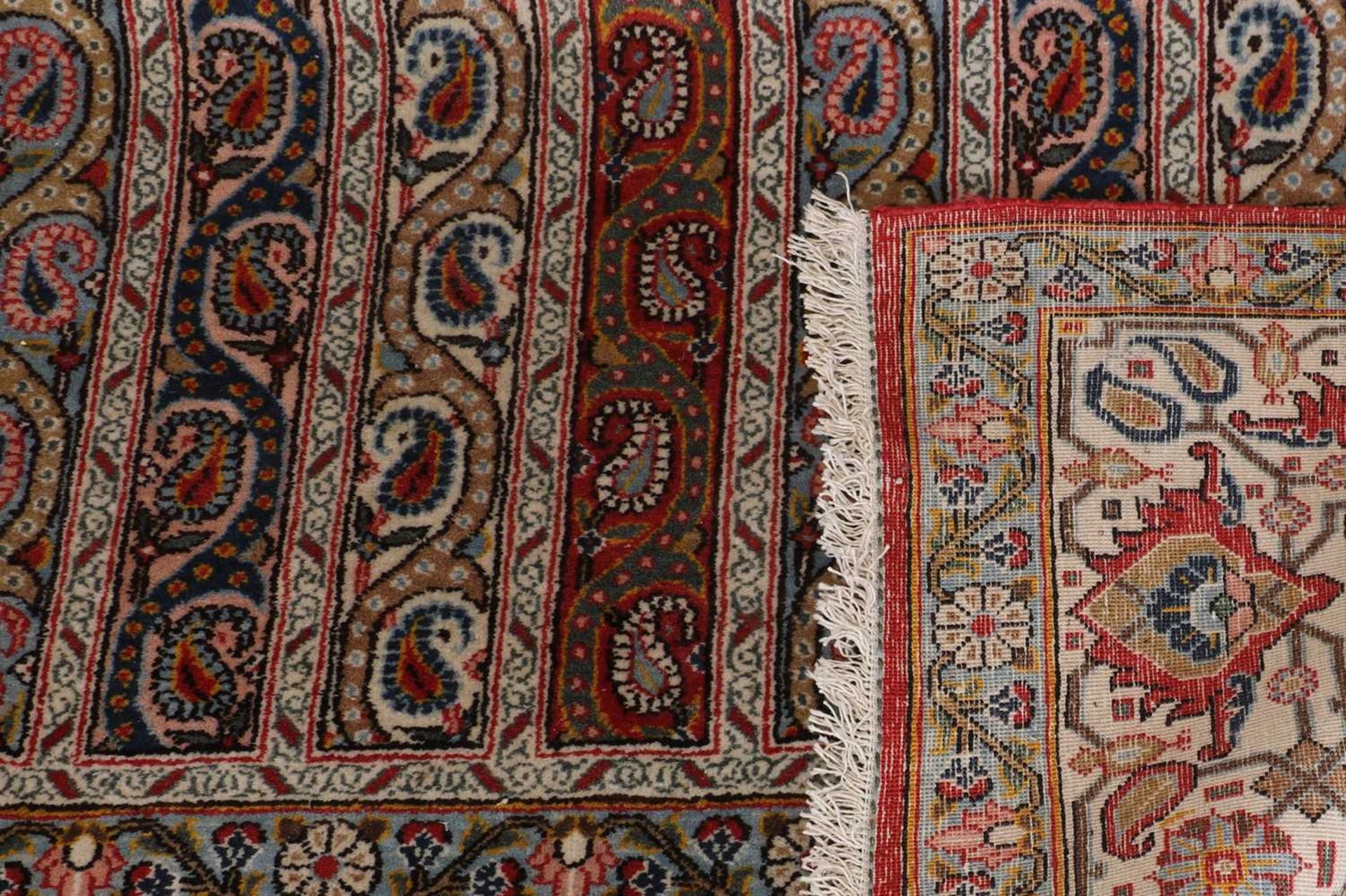 A Persian wool carpet, - Image 6 of 12