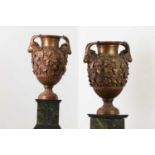 A pair of grand tour bronze urns by the workshop of Benedetto Boschetti,