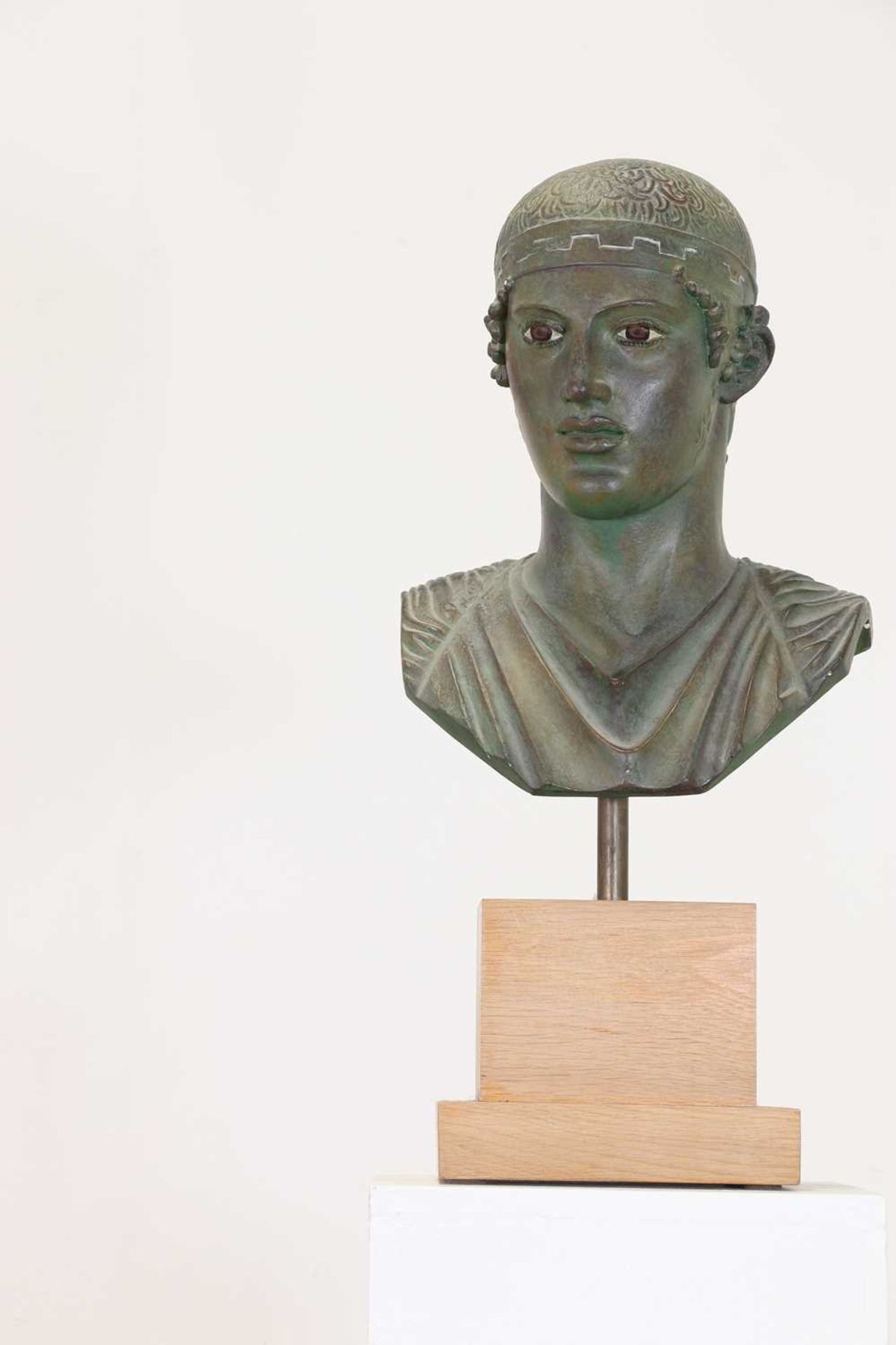A painted plaster bust after the antique,